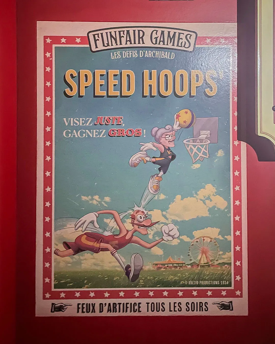 Speed Hoops poster on a red wall showing Micheline dunking a basketball over Archibald