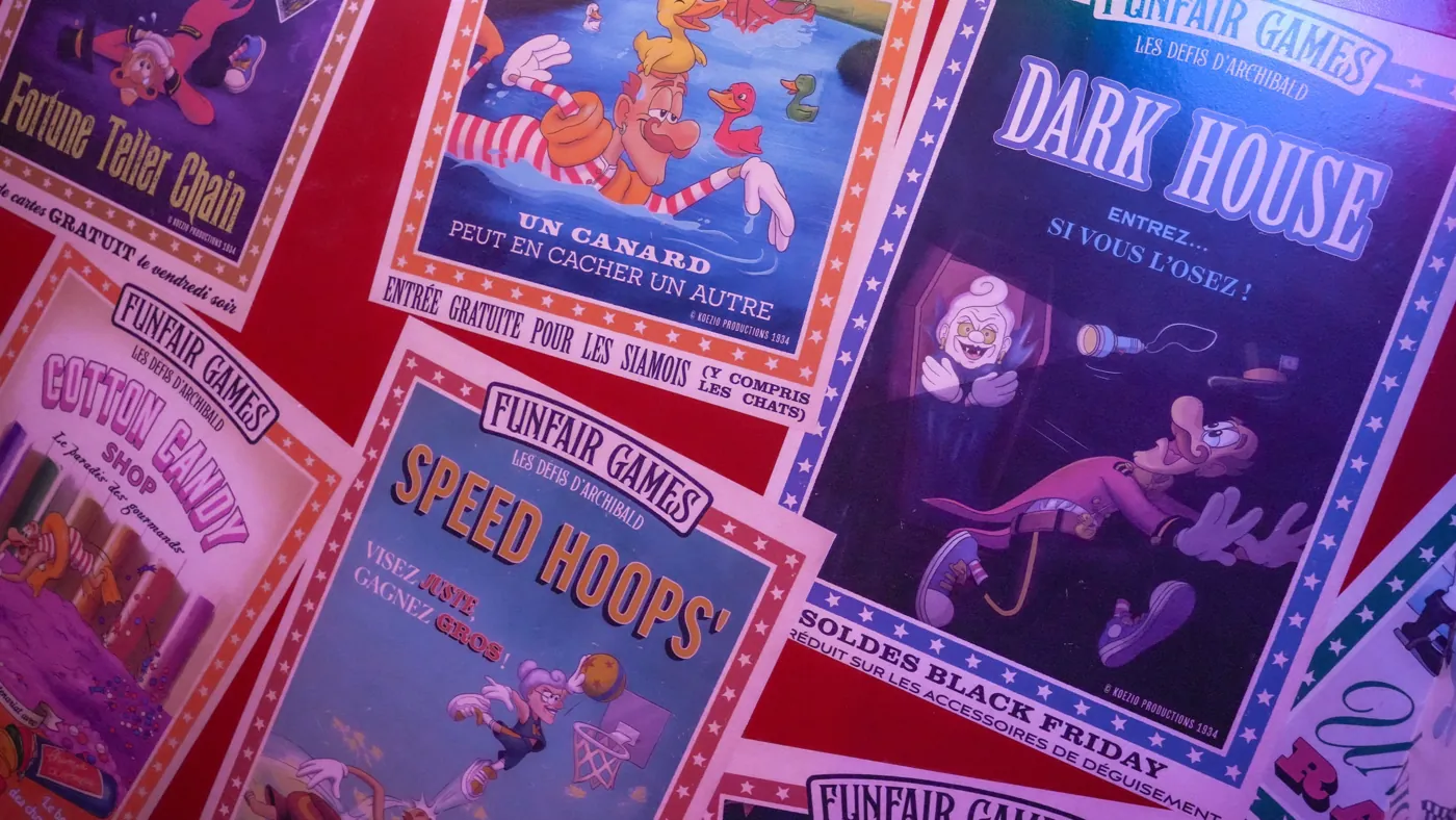 Wall of installed Funfair Games posters lit in pink and purple, including Dark House and Speed Hoops