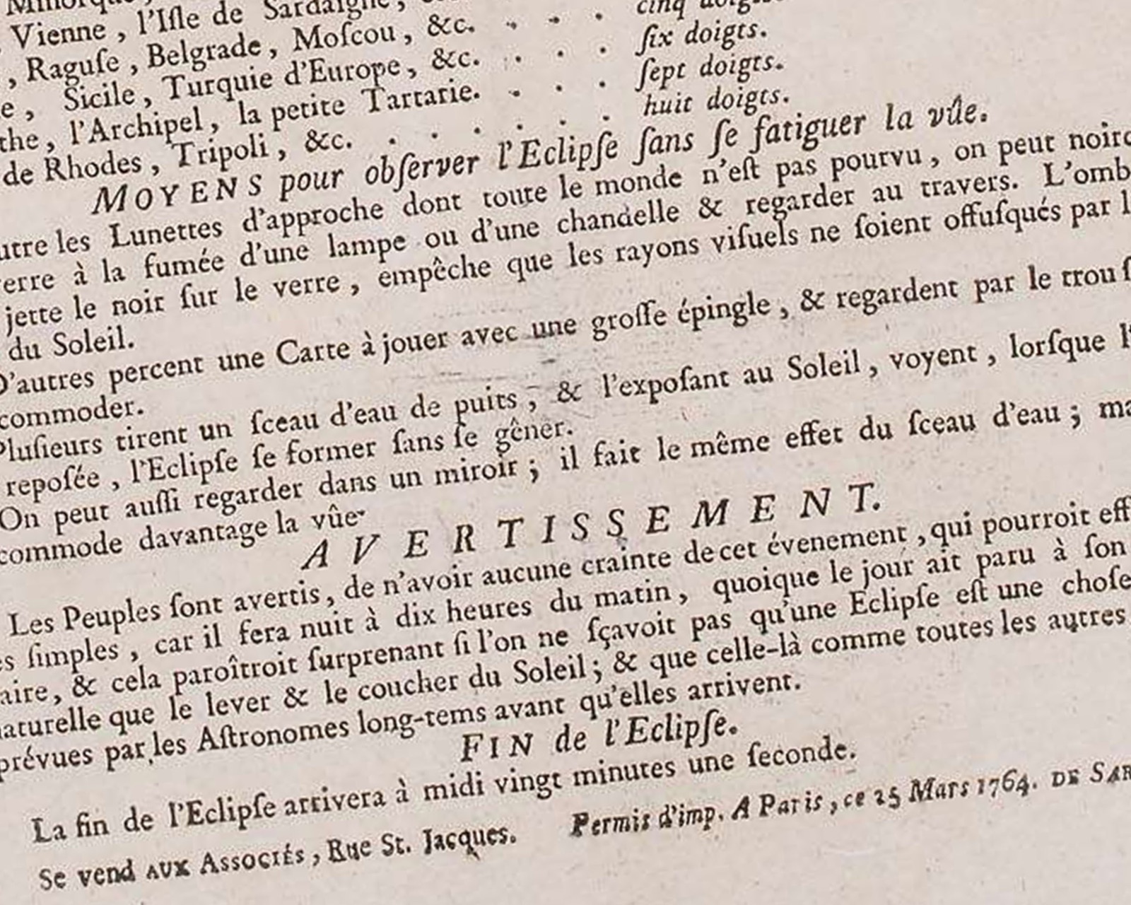 une affiche française annonçant une éclipse solaire le 1er avril 1764, avec une illustration de la Lune passant devant le Soleil et un texte imprimé en caractères du XVIIIe siècle.